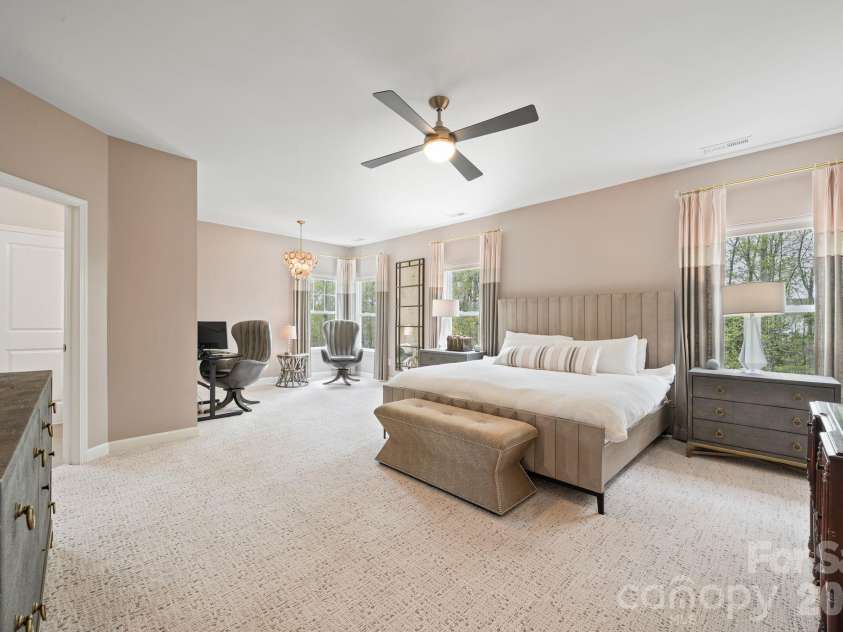 3022 Manchester Court, Indian Land, SC 29707.  MLS# CAR4358002, YatesRealty ID 23489. Primary Suite- features motorized shades, tons of natural light, and a sitting nook