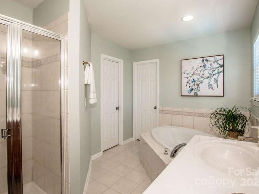 2344 Smith Cove Road, Denver, NC 28037.  MLS# CAR4321510, YatesRealty ID 2349. Primary Bath- Water closet, walk-in closet and soaking tub