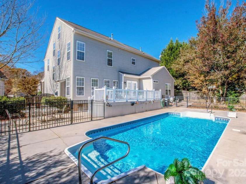 2344 Smith Cove Road, Denver, NC 28037.  MLS# CAR4321510, YatesRealty ID 2349. Safety Aluminum fencing surrounds the pool deck