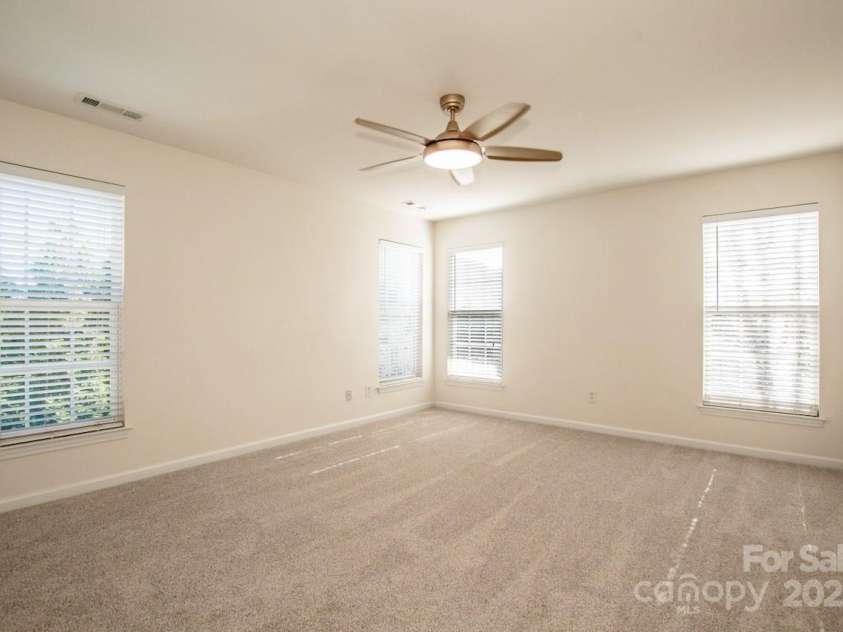 2344 Smith Cove Road, Denver, NC 28037.  MLS# CAR4321510, YatesRealty ID 2349. Upper level Primary Bedroom