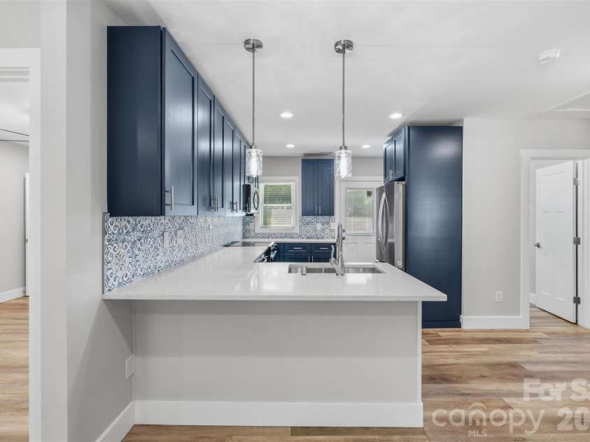 2414 Dickens Avenue, Charlotte, NC 28208.  MLS# CAR4325428, YatesRealty ID 2350. Kitchen w/ Breakfast Bar