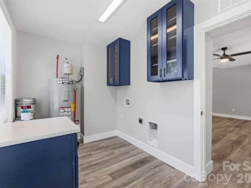 2414 Dickens Avenue, Charlotte, NC 28208.  MLS# CAR4325428, YatesRealty ID 2350. Large Laundry Room w/ Storage