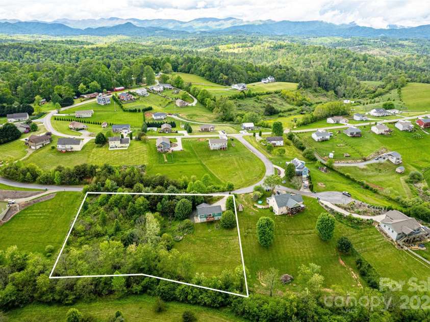 18 Benzington Way, Leicester, NC 28748.  MLS# CAR4254424, YatesRealty ID 23504. 