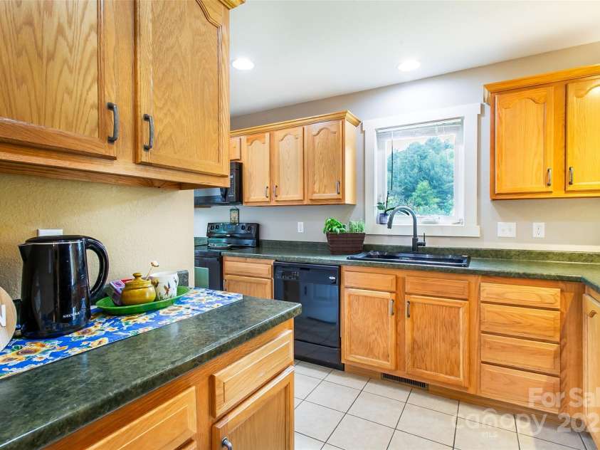 18 Benzington Way, Leicester, NC 28748.  MLS# CAR4254424, YatesRealty ID 23504. 