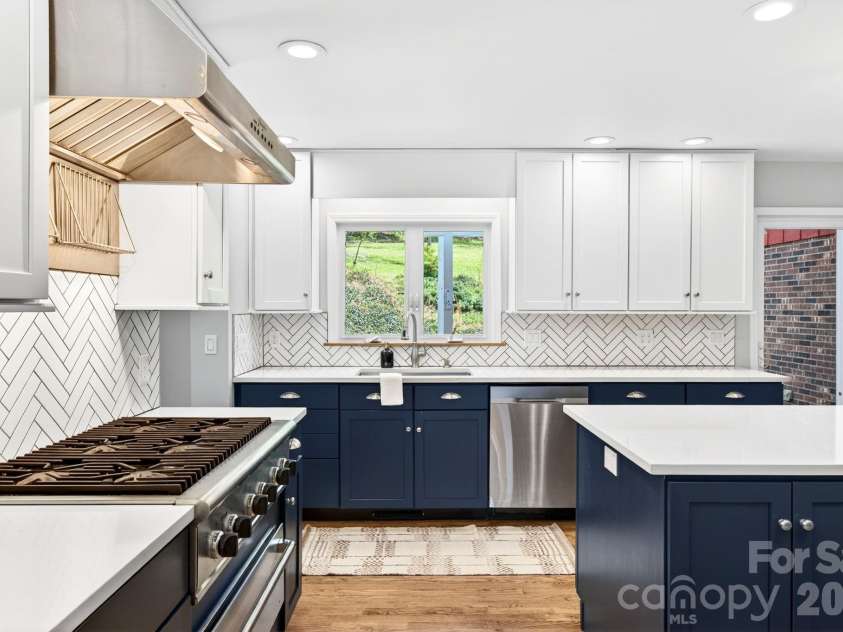 58 Camby Drive, Fairview, NC 28730.  MLS# CAR4371628, YatesRealty ID 23505. Beautiful Kitchen with Herringbone Backsplash