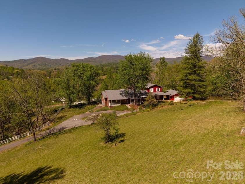 58 Camby Drive, Fairview, NC 28730.  MLS# CAR4371628, YatesRealty ID 23505. Gently Sloping Front Yard