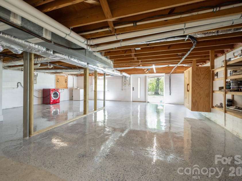58 Camby Drive, Fairview, NC 28730.  MLS# CAR4371628, YatesRealty ID 23505. New Epoxy in a Portion of the Basement