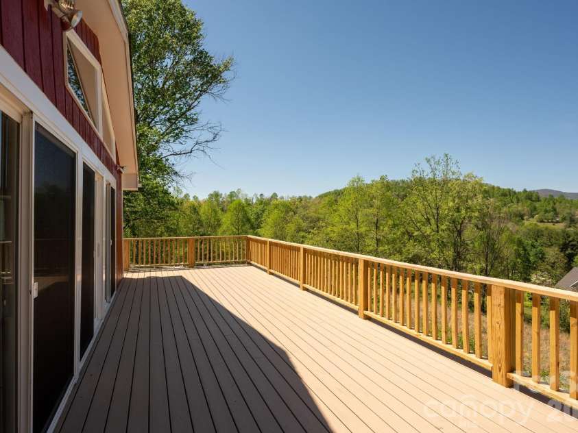 58 Camby Drive, Fairview, NC 28730.  MLS# CAR4371628, YatesRealty ID 23505. New Trex Decking