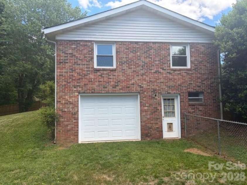 242 Edgewood Circle, Morganton, NC 28655.  MLS# CAR4381653, YatesRealty ID 23506. Basement garage adds more car storage!