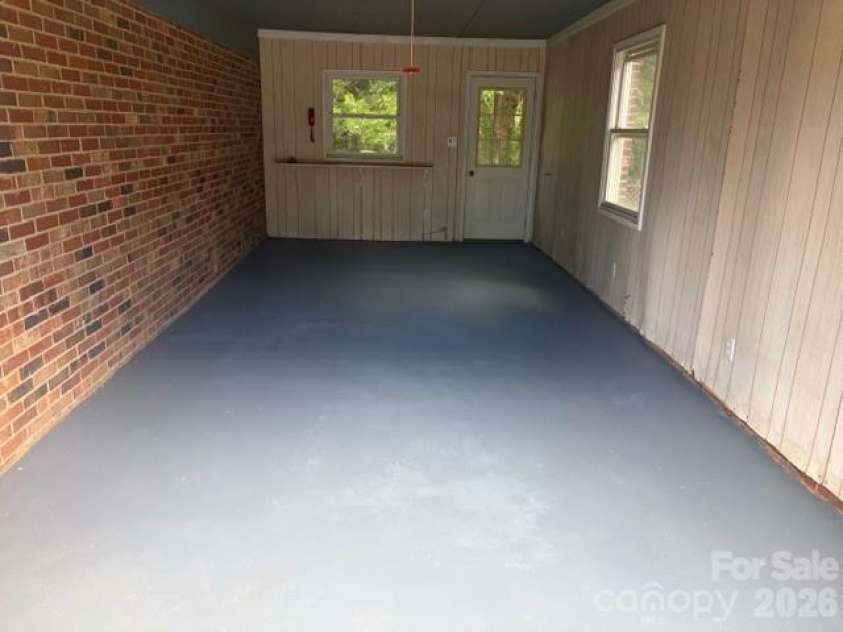 242 Edgewood Circle, Morganton, NC 28655.  MLS# CAR4381653, YatesRealty ID 23506. Freshly painted main level garage