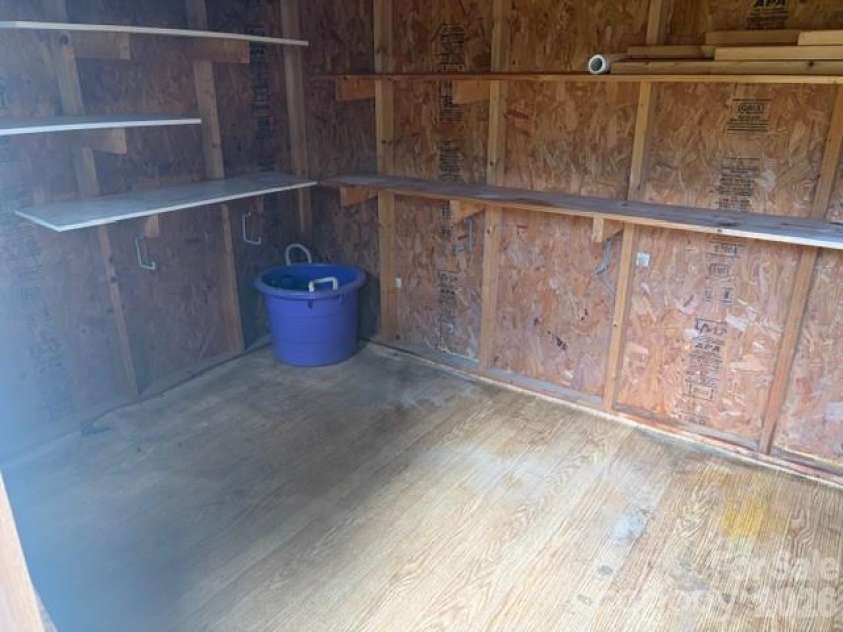 242 Edgewood Circle, Morganton, NC 28655.  MLS# CAR4381653, YatesRealty ID 23506. Interior of outbuilding