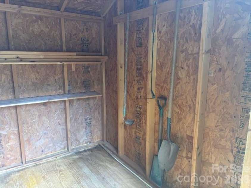 242 Edgewood Circle, Morganton, NC 28655.  MLS# CAR4381653, YatesRealty ID 23506. Interior of outbuilding