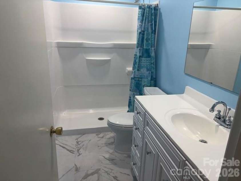 242 Edgewood Circle, Morganton, NC 28655.  MLS# CAR4381653, YatesRealty ID 23506. Main bath has new walk in shower