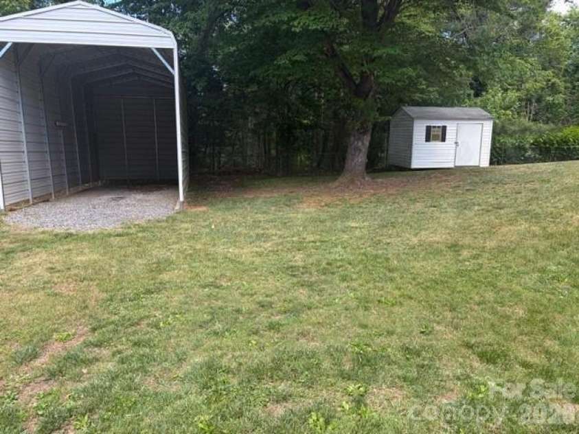 242 Edgewood Circle, Morganton, NC 28655.  MLS# CAR4381653, YatesRealty ID 23506. RV garage and large storage building