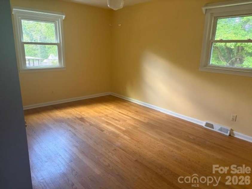 242 Edgewood Circle, Morganton, NC 28655.  MLS# CAR4381653, YatesRealty ID 23506. Spacious primary bedroom