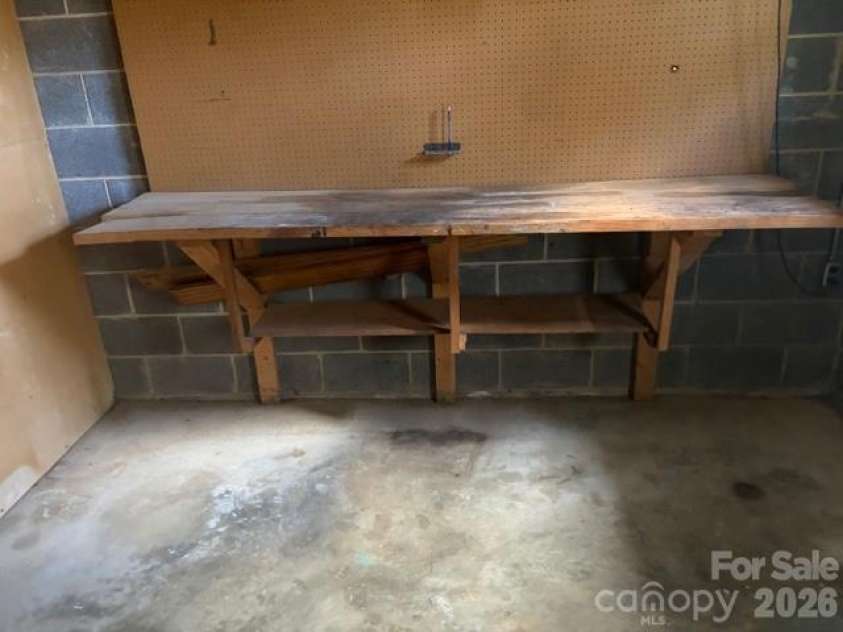 242 Edgewood Circle, Morganton, NC 28655.  MLS# CAR4381653, YatesRealty ID 23506. Workbench in Unfinished area in basement