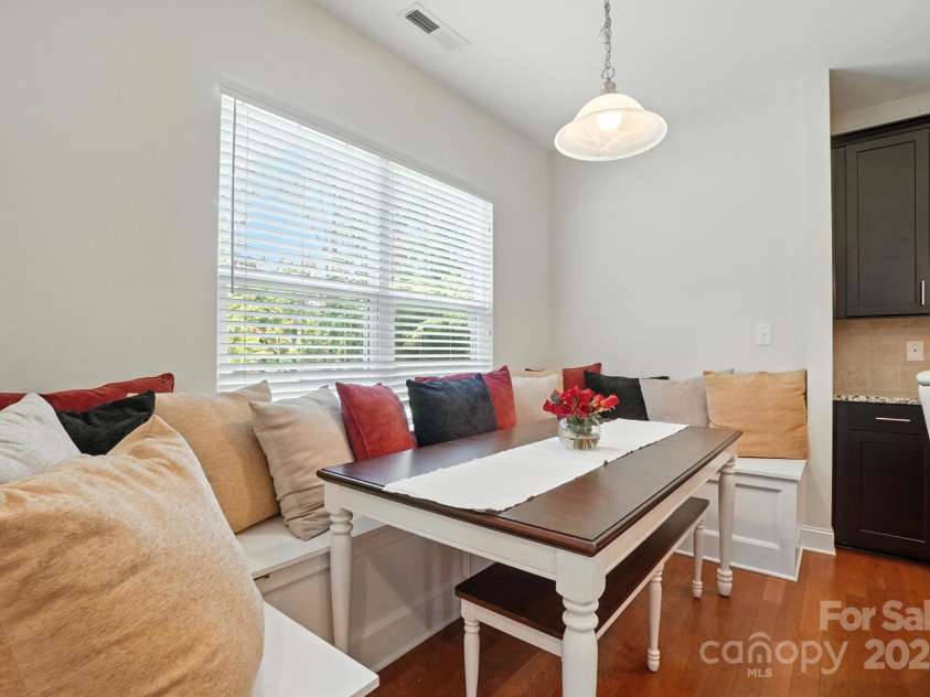 8275 Normandy Road, Denver, NC 28037.  MLS# CAR4276135, YatesRealty ID 23508. Sunny breakfast area w/ built-in banquette.