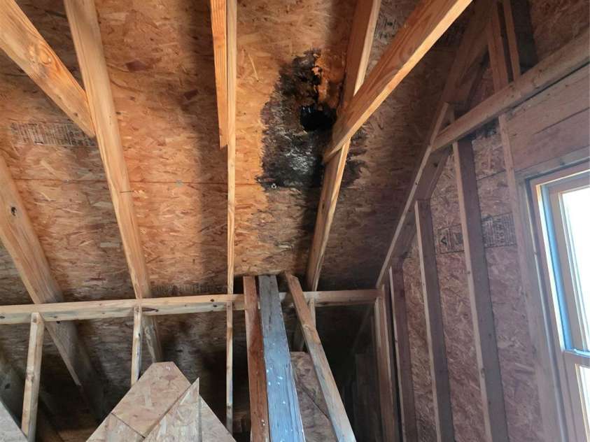 6490 Globe Road, Lenoir, NC 28645.  MLS# CAR4281988, YatesRealty ID 2351. Damage from hole shot in roof, interior