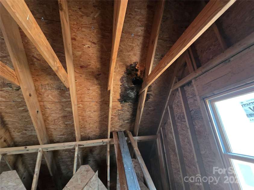 6490 Globe Road, Lenoir, NC 28645.  MLS# CAR4281988, YatesRealty ID 2351. Leak in roof from hole