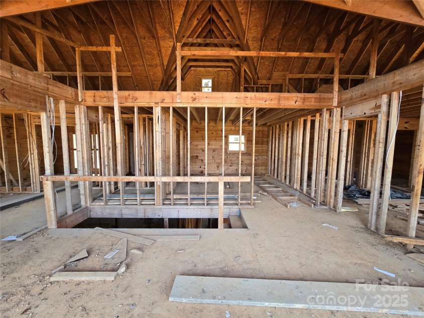 6490 Globe Road, Lenoir, NC 28645.  MLS# CAR4281988, YatesRealty ID 2351. Looking from great room to loft