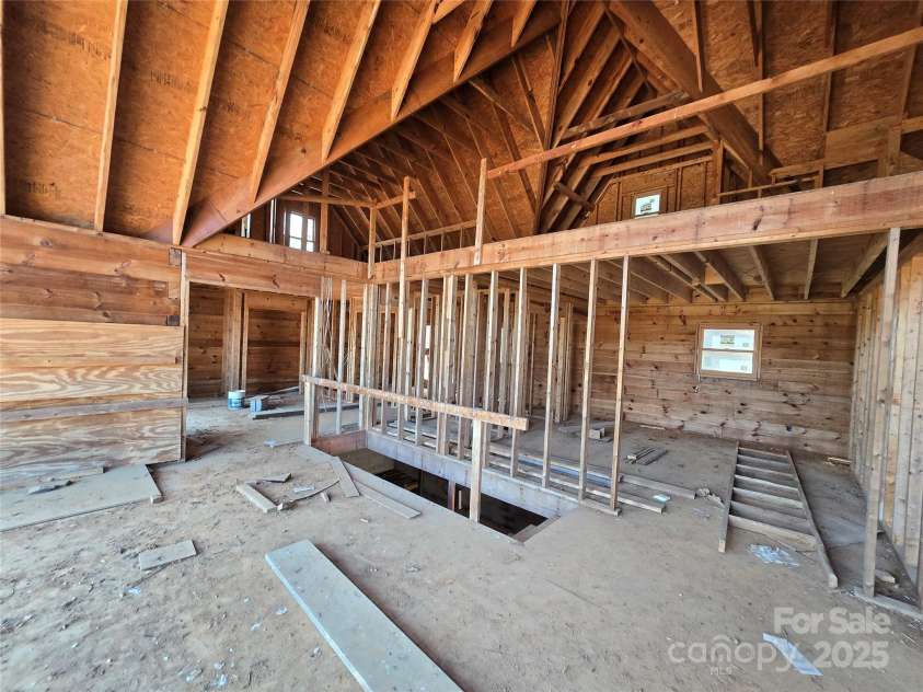 6490 Globe Road, Lenoir, NC 28645.  MLS# CAR4281988, YatesRealty ID 2351. Looking from great room to upstairs loft