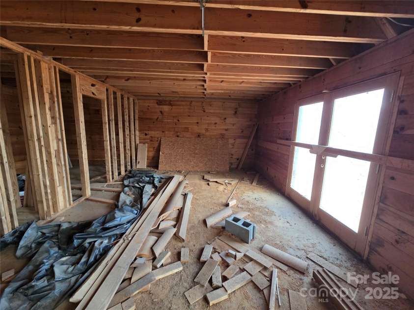 6490 Globe Road, Lenoir, NC 28645.  MLS# CAR4281988, YatesRealty ID 2351. Primary bedroom, closet opening on left, bathroom opening also on left