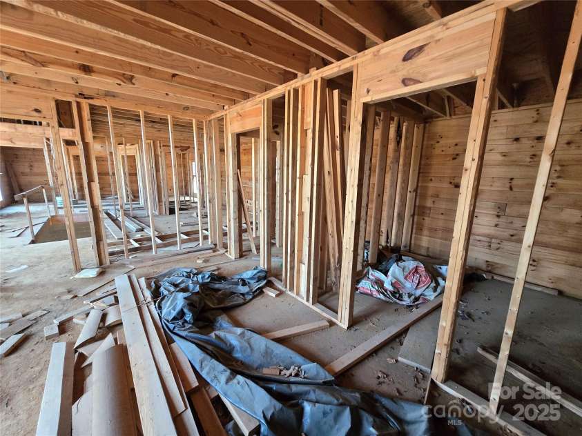 6490 Globe Road, Lenoir, NC 28645.  MLS# CAR4281988, YatesRealty ID 2351. Primary bedroom, looking towards closet door, bathroom door