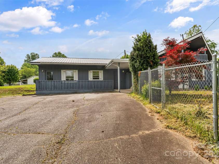 493 Dogwood Road, Candler, NC 28715.  MLS# CAR4257818, YatesRealty ID 23510. Plenty of parking and room to turn around