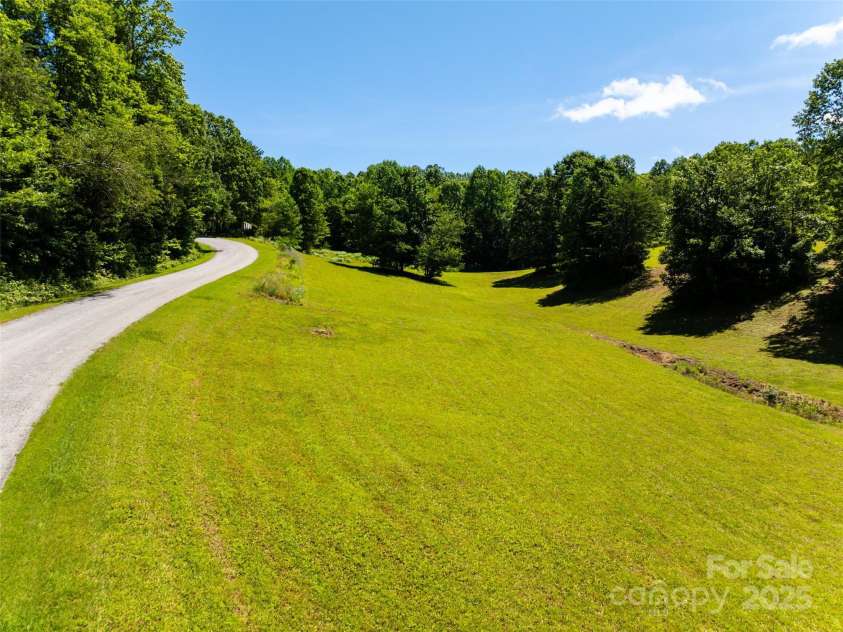 129 Melrose Lake Road, Saluda, NC 28773.  MLS# CAR4272471, YatesRealty ID 23512. 