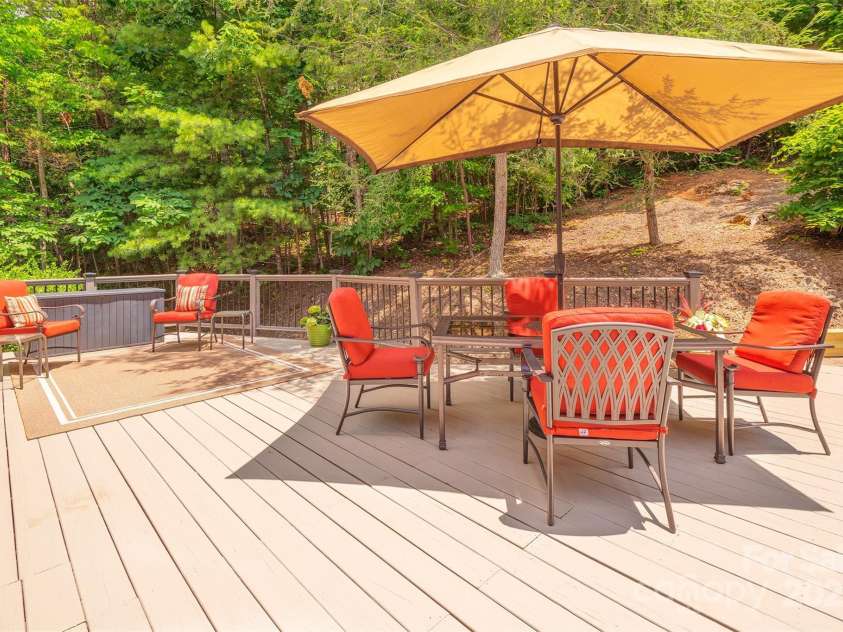 65 Hillcrest Drive, Weaverville, NC 28787.  MLS# CAR4275915, YatesRealty ID 23514. Back porch off primary suite