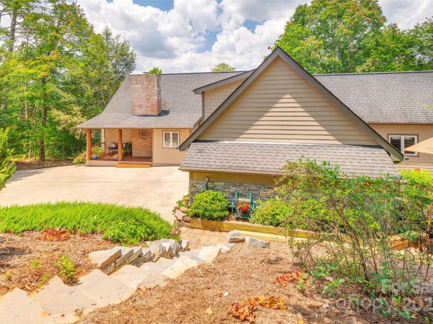 65 Hillcrest Drive, Weaverville, NC 28787.  MLS# CAR4275915, YatesRealty ID 23514. Back view coming down from High Bluff Dr