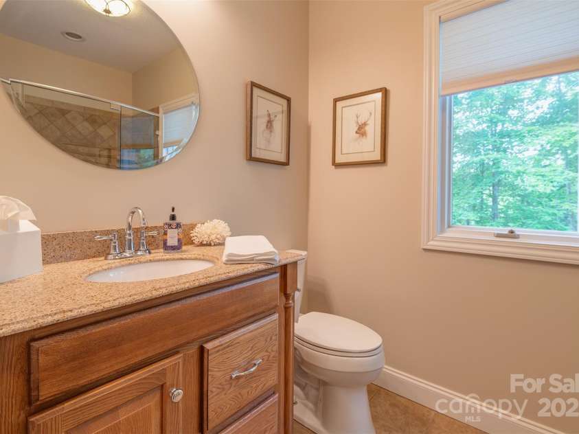 65 Hillcrest Drive, Weaverville, NC 28787.  MLS# CAR4275915, YatesRealty ID 23514. Bathroom three of four