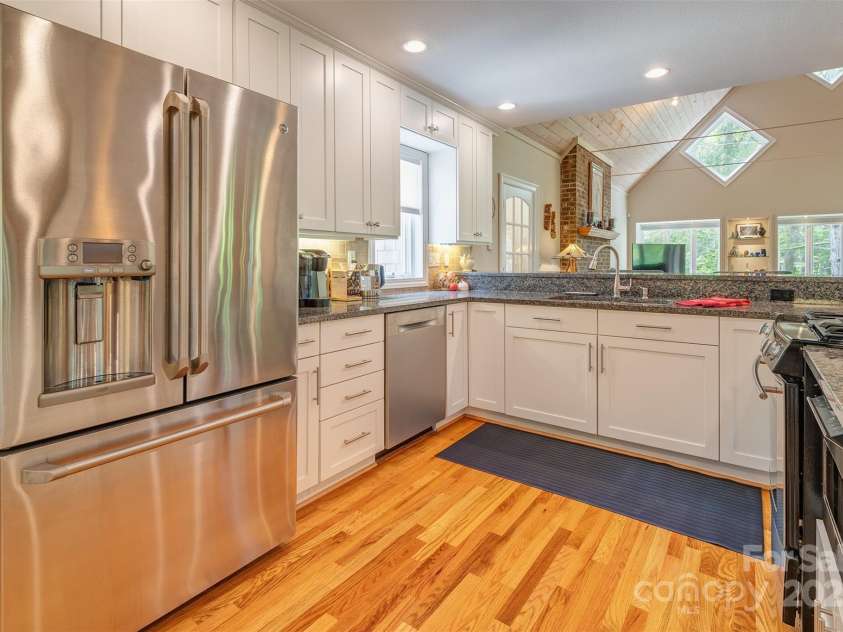 65 Hillcrest Drive, Weaverville, NC 28787.  MLS# CAR4275915, YatesRealty ID 23514. Beautiful open kitchen with lots of cabinetry