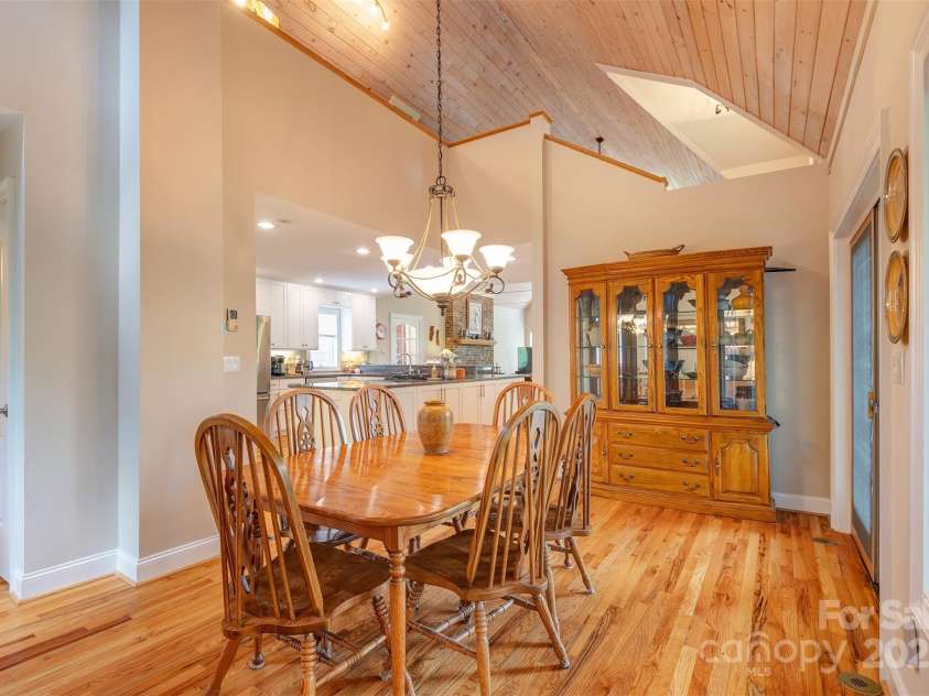 65 Hillcrest Drive, Weaverville, NC 28787.  MLS# CAR4275915, YatesRealty ID 23514. Dining room to kitchen