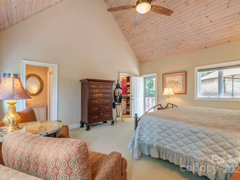 65 Hillcrest Drive, Weaverville, NC 28787.  MLS# CAR4275915, YatesRealty ID 23514. Huge primary suite addition with vaulted ceiling, walk-in closet, huge bathroom and deck off the back