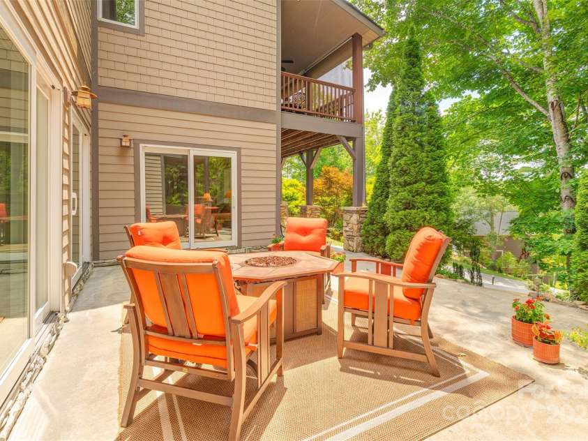 65 Hillcrest Drive, Weaverville, NC 28787.  MLS# CAR4275915, YatesRealty ID 23514. Lower level porch with access to family room area