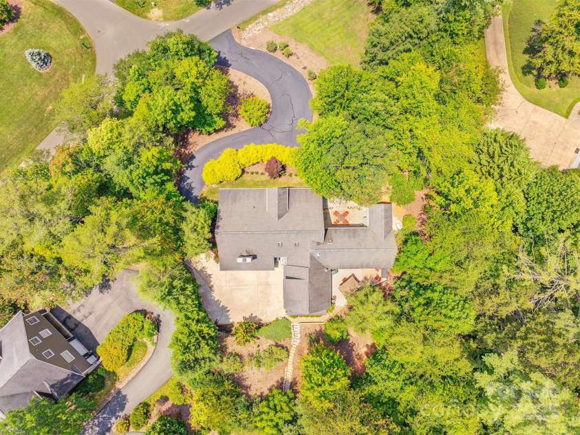 65 Hillcrest Drive, Weaverville, NC 28787.  MLS# CAR4275915, YatesRealty ID 23514. Major 2007-2008 remodel with new interior staircase, hardiplank siding, new primary suite addition, reworked driveway, landscaping stones and much much more (ask for full list of improvements)!