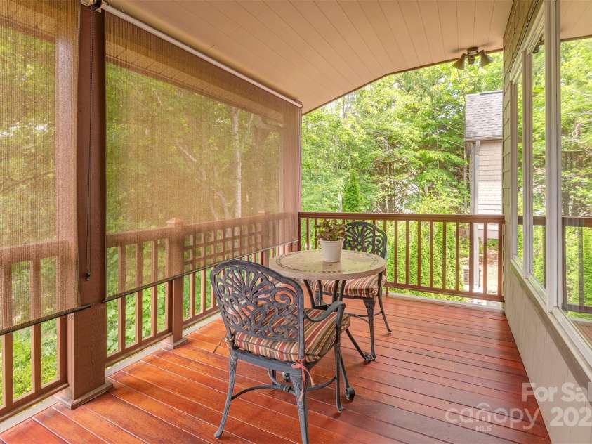 65 Hillcrest Drive, Weaverville, NC 28787.  MLS# CAR4275915, YatesRealty ID 23514. Upper level porch has shades for extra sunny days