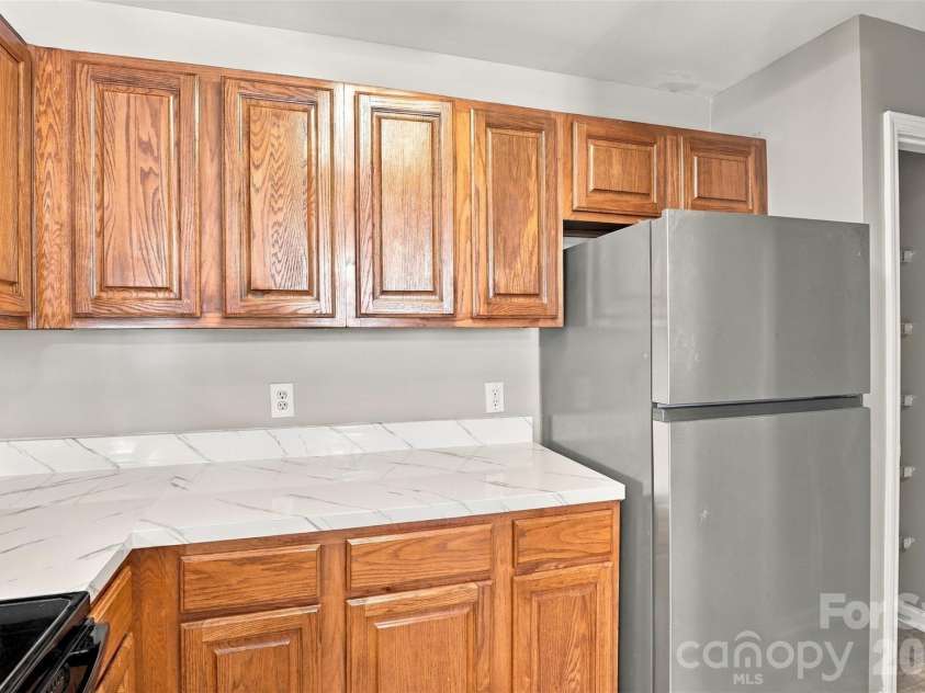 9709 Campus Walk Lane, Charlotte, NC 28262.  MLS# CAR4428157, YatesRealty ID 23516. 