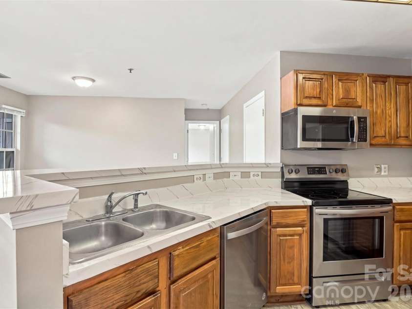 9709 Campus Walk Lane, Charlotte, NC 28262.  MLS# CAR4428157, YatesRealty ID 23516. Kitchen