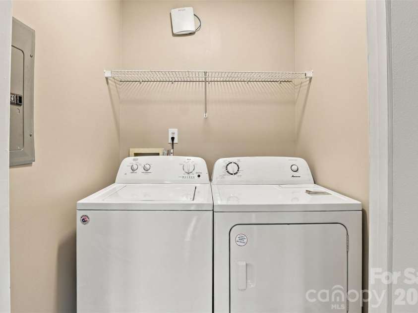 9709 Campus Walk Lane, Charlotte, NC 28262.  MLS# CAR4428157, YatesRealty ID 23516. Laundry Room
