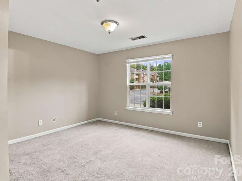 9709 Campus Walk Lane, Charlotte, NC 28262.  MLS# CAR4428157, YatesRealty ID 23516. Master Bedroom