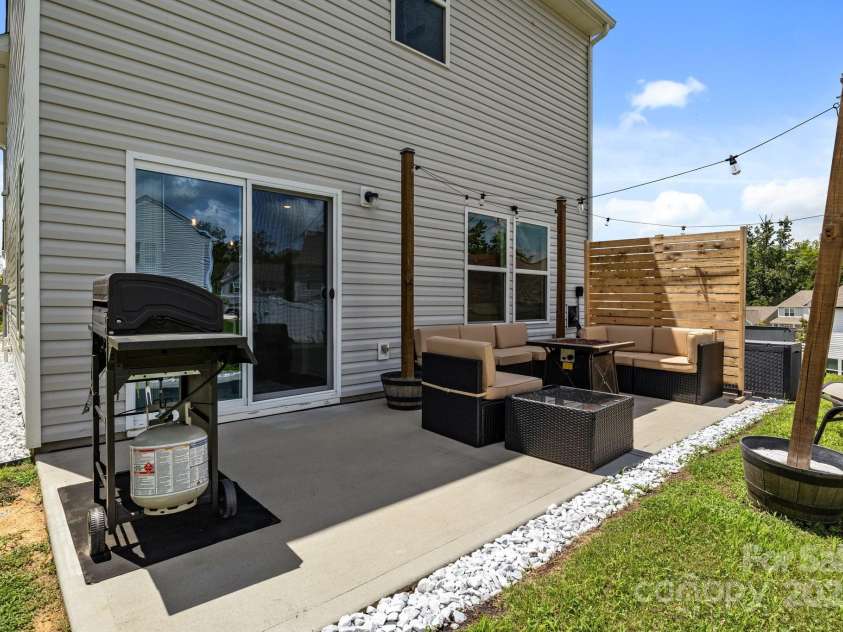 1207 Skyflower Way, Charlotte, NC 28214.  MLS# CAR4269220, YatesRealty ID 23518. Extended rear patio