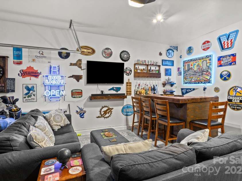 1207 Skyflower Way, Charlotte, NC 28214.  MLS# CAR4269220, YatesRealty ID 23518. Garage is an additional hangout area!