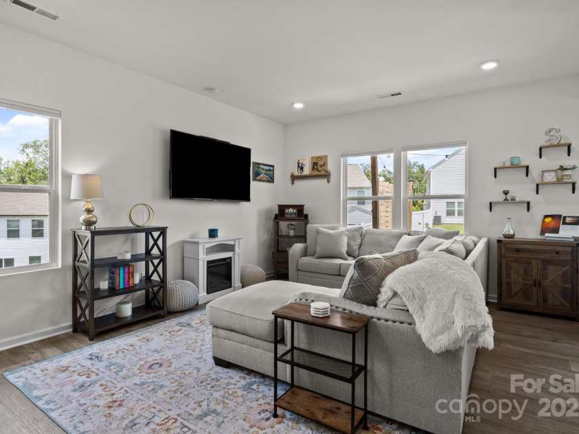 1207 Skyflower Way, Charlotte, NC 28214.  MLS# CAR4269220, YatesRealty ID 23518. Natural light floods the living room