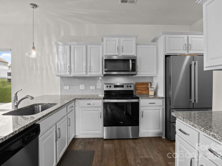 1207 Skyflower Way, Charlotte, NC 28214.  MLS# CAR4269220, YatesRealty ID 23518. Stainless appliance package