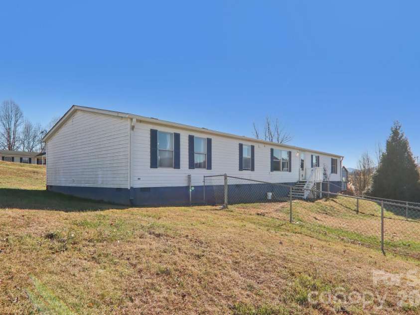 99 Colton Drive, Leicester, NC 28748.  MLS# CAR4324763, YatesRealty ID 2352. 