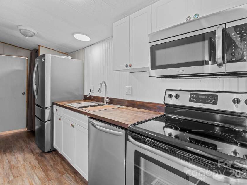 165 Cardinal Drive, New London, NC 27371.  MLS# CAR4256432, YatesRealty ID 23521. 