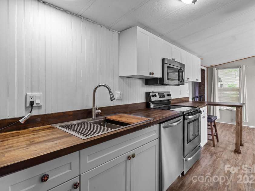 165 Cardinal Drive, New London, NC 27371.  MLS# CAR4256432, YatesRealty ID 23521. 