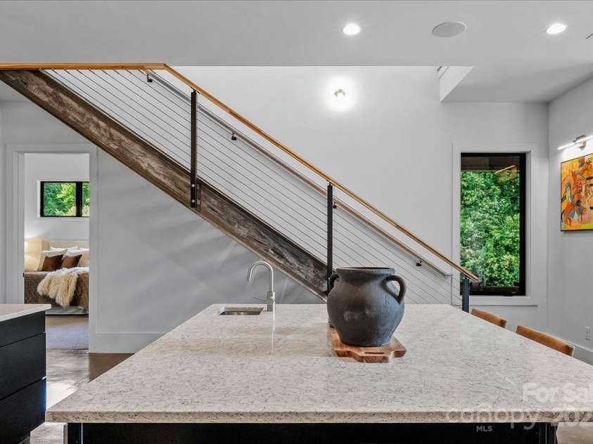 3304 Mar Vista Circle, Charlotte, NC 28209.  MLS# CAR4269142, YatesRealty ID 23531. Custom open steel stairs with Douglas fir steps lead to second floor